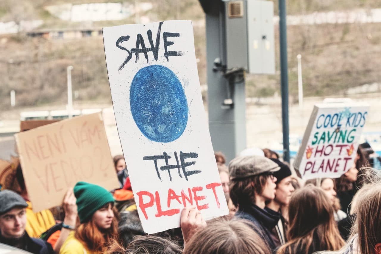 The protest gets photographed. The drought doesn't.